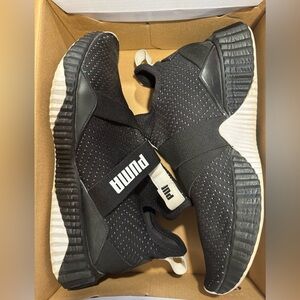 Women’s Defy Mid Core Black and White Pumas-Size 11